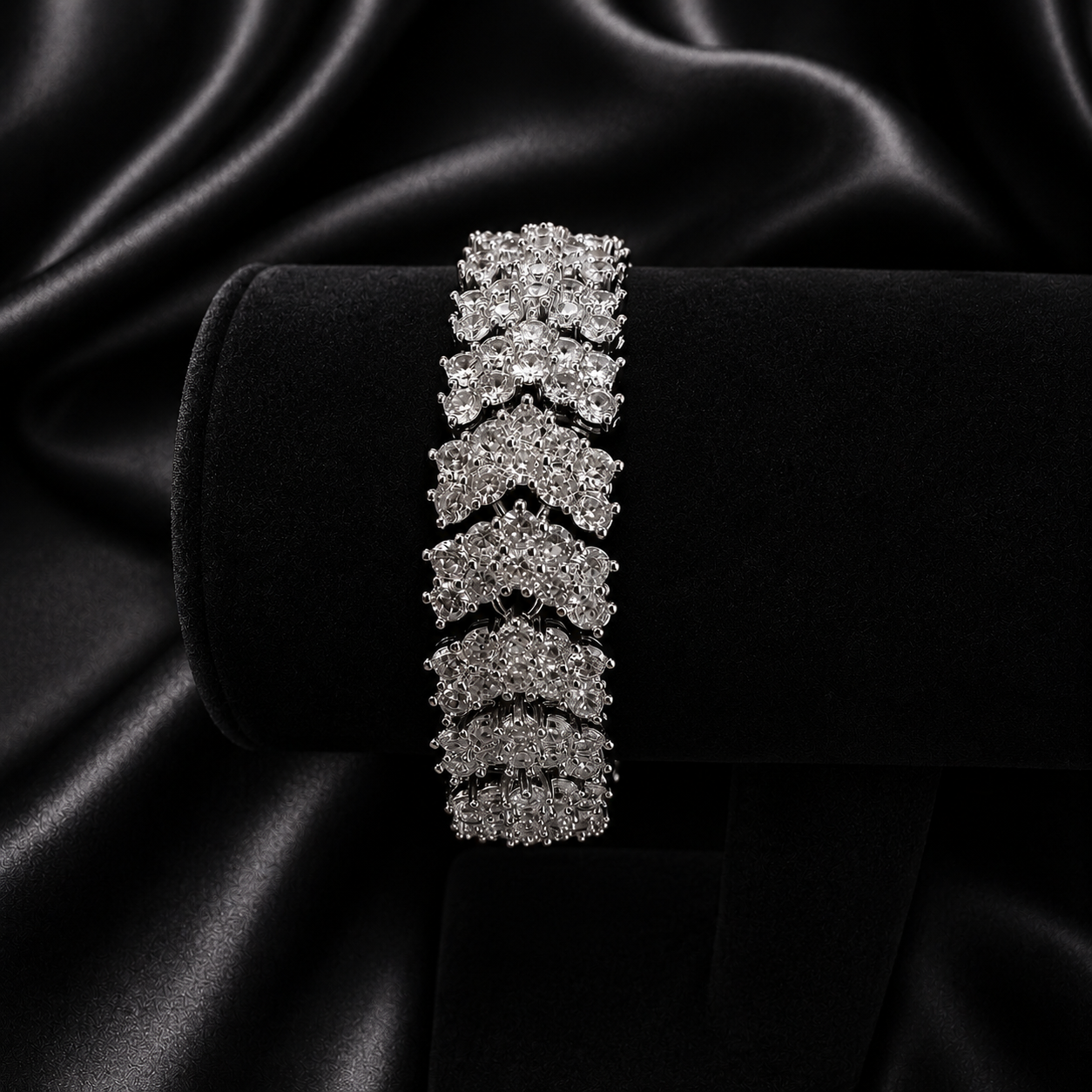 Diamond bracelet on a black satin background